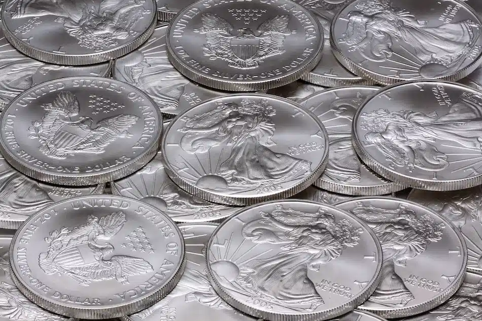 A collection of American Silver Eagle coins.