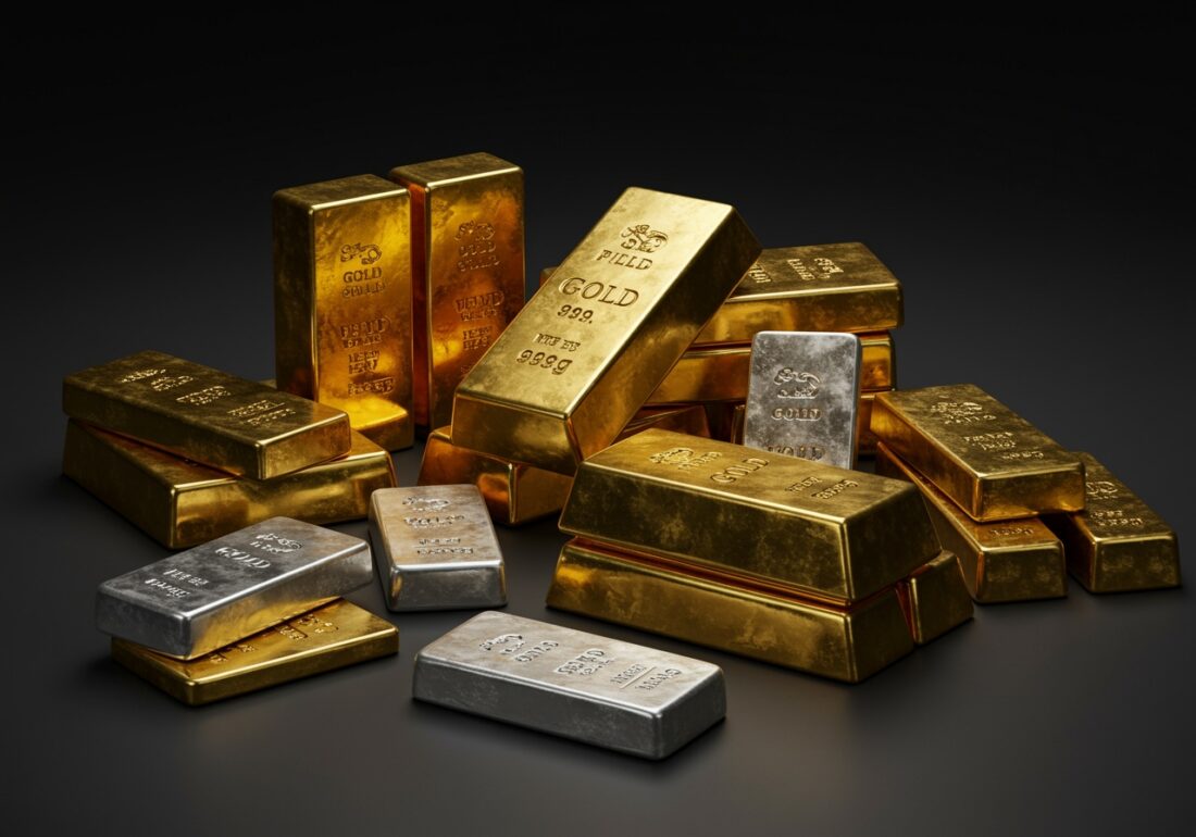 Gold and silver bullion bars illustrating the gold market outlook ahead of the Federal Reserve's upcoming interest-rate decision.