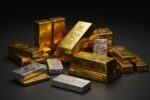 Gold and silver bullion bars illustrating the gold market outlook ahead of the Federal Reserve's upcoming interest-rate decision.